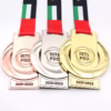AJP medals in gold, silver, and bronze colors with ribbon.