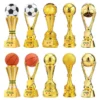 Gold trophy showcasing a soccer ball, basketball, and football, highlighting success in football and other sports.