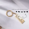 سلسلة مفاتيح أميليا ذهبية مستطيلة الشكل لإضافة الزينة