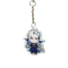 Un llavero con un personaje de anime azul y blanco de Genshin Impact, fabricado en acrílico, con colores vibrantes y un diseño intrincado.