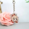 Un llavero acrílico de Genshin Impact con un vibrante diseño de personajes de dibujos animados, perfecto para fans y coleccionistas.