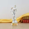 A silver trophy featuring a detailed soccer player figure atop its gleaming surface, symbolizing athletic achievement.