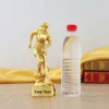 A custom-engraved gold football trophy, showcasing a blend of elegance and recognition for sporting accomplishments.