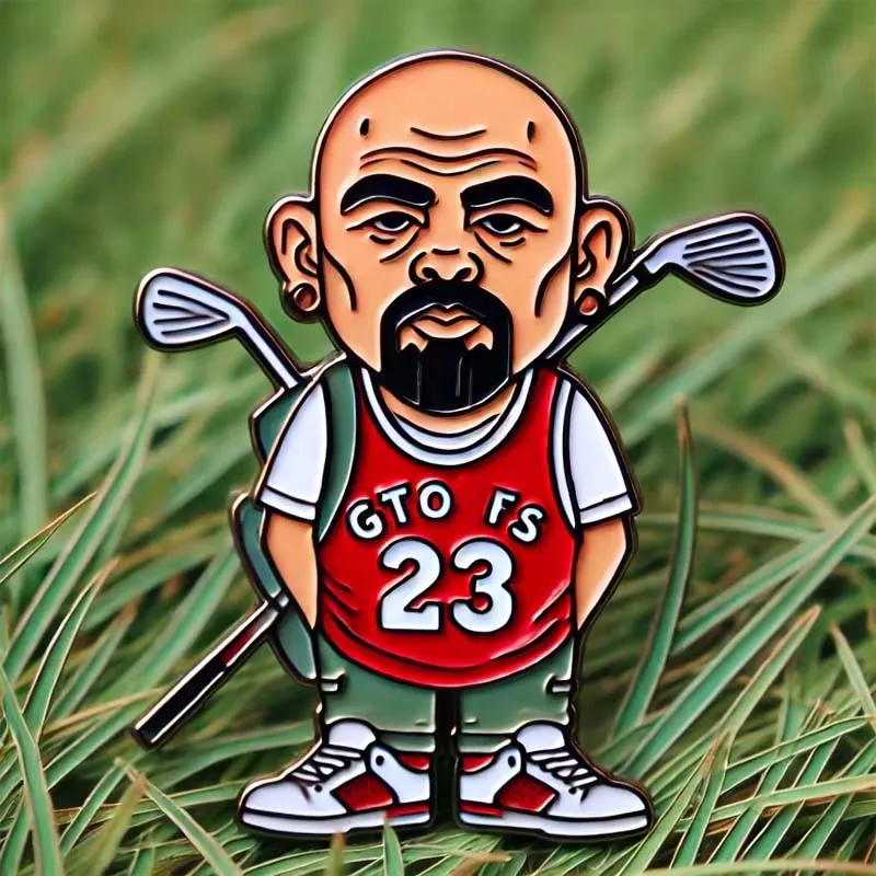 Cartoon character holding a golf club on a pin, designed for use with a golf divot tool.