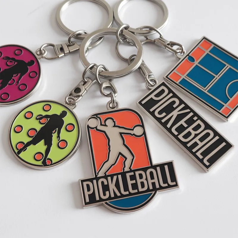 A vibrant pickleball keychain featuring a miniature pickleball design, perfect for enthusiasts and players alike.