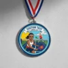 A medal featuring a cartoon tennis player, designed for a pickleball tournament.