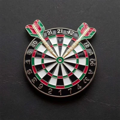 A badge showcasing a pin with a dart at its center, representing a darts theme.