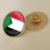 Goldene Reversnadel mit der Flagge des Sudan, die Nationalstolz und Identität symbolisiert.