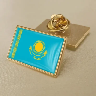 Gold and blue lapel pins featuring the Kazakhstan flag, ideal for wholesale distribution.