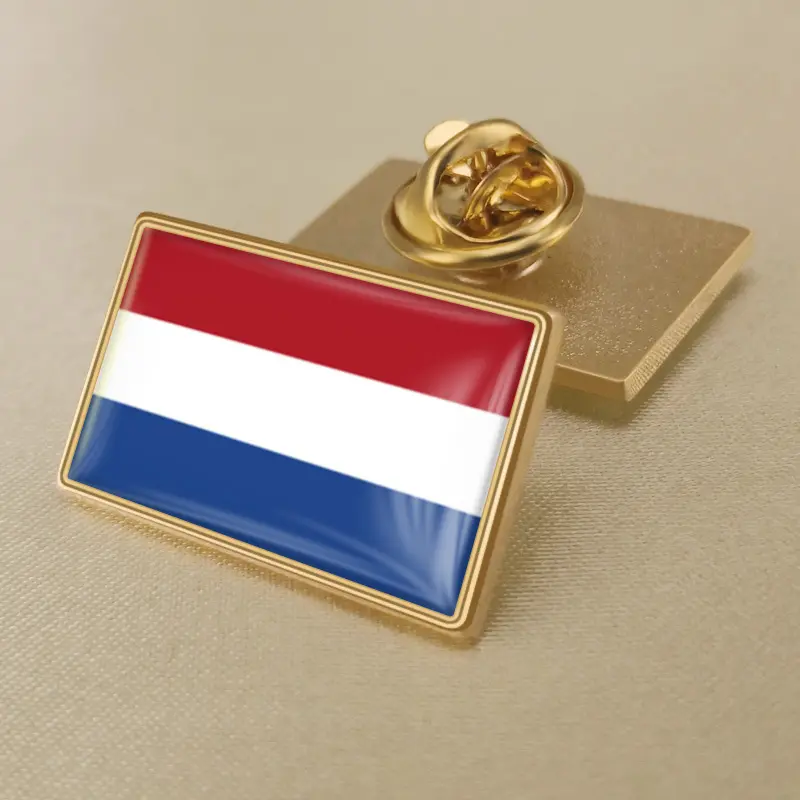 Gold and blue pin featuring the Netherlands flag, ideal for wholesale distribution.