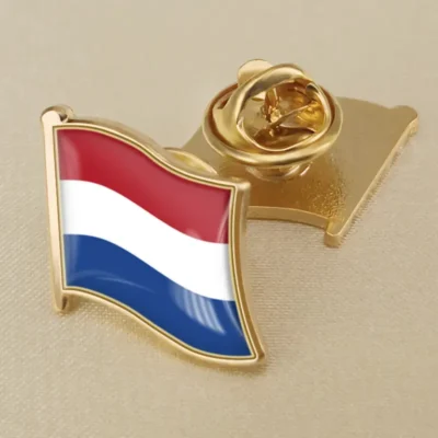 Gold and blue pin featuring the Netherlands flag, ideal for wholesale distribution.