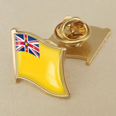 A pin featuring the flag of niue, ideal for collectors and enthusiasts of national symbols.