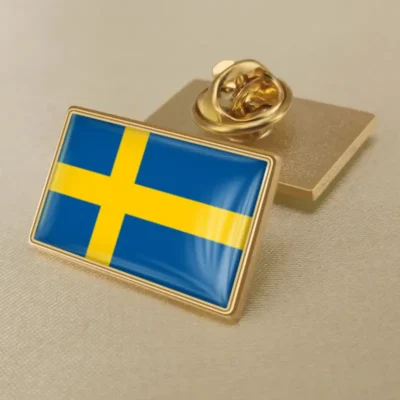 Sweden flag lapel pin showcasing vibrant colors, ideal for wholesale distribution and patriotic displays.