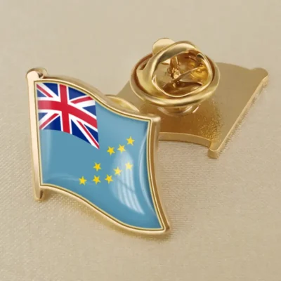 A lapel pin featuring the flag of Tuvalu, showcasing its vibrant colors and design,