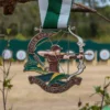 Medalla personalizada con la inscripción "Peakeen Archery Championship" para el reconocimiento de competiciones de tiro con arco.