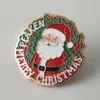 Festive custom pin showcasing Santa Claus with "Peakeen Merry Christmas" text, ideal for holiday events and gifts.