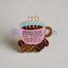 Custom enamel pin featuring a peakeen coffee design, perfect for coffee lovers and collectors.