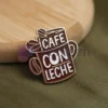 Custom enamel pin featuring a peakeen coffee design, perfect for coffee lovers and collectors.