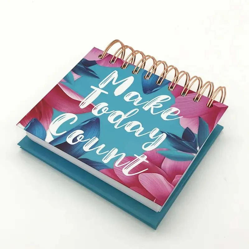 A spiral notebook with the phrase "Make Today Count," designed for custom calendars and daily planning.