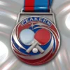Custom table tennis medal featuring a ping pong ball and a tennis racket design.