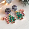 Custom Christmas earrings featuring a festive Christmas tree and candy cane design, perfect for holiday celebrations.