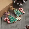Custom Christmas earrings featuring a festive Christmas tree and candy cane design, perfect for holiday celebrations.