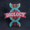 Custom pin featuring the word "Biology," designed for science enthusiasts and educators.