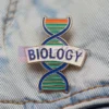 Custom pin featuring the word "Biology," designed for science enthusiasts and educators.