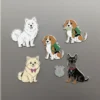 A set of four colorful dog-themed refrigerator magnets showcasing different dog breeds.