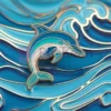 海洋生物と文学への愛を象徴する、開いた本の上に置かれたイルカのカスタムピン。