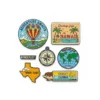 A set of colorful travel fridge magnets representing various states, arranged around a detailed map of the United States.