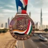 Medaglia con la scritta "Emirati Arabi Uniti", con un design personalizzato per il riconoscimento e i risultati degli Emirati Arabi Uniti.