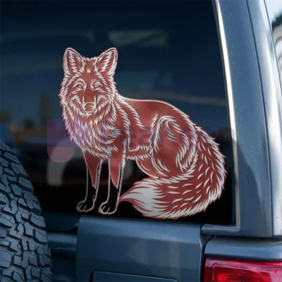 Custom red fox sticker on a car's rear, highlighting a playful and artistic touch.