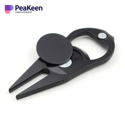 A black plastic bottle opener featuring a sleek black handle, designed for convenience and style, alongside a golf divot tool.