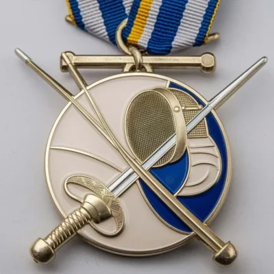 A custom fencing medal featuring two crossed swords and a blue ribbon, symbolizing achievement in the sport.