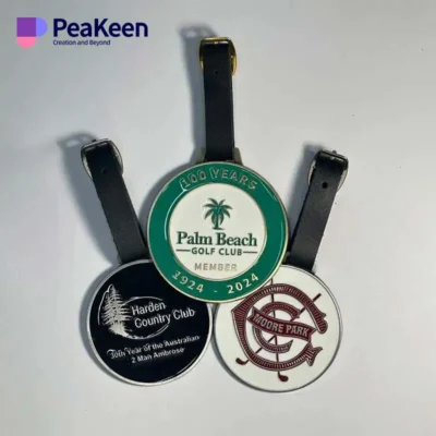 Three golf bag tags featuring the Palm Beach Golf Club logo, showcasing vibrant colors and unique designs.