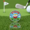 Golf ball marker featuring the phrase "golf buddy" repeated multiple times in a playful design.