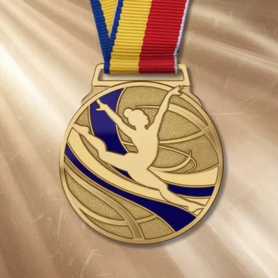 A gold medal featuring a woman elegantly posed in ballet, symbolizing achievement in gymnastics.