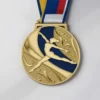 Золотая медаль с изображением женщины в центре, разработанная для индивидуальных наград по гимнастике.