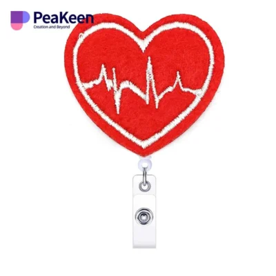 A red heart-shaped badge holder featuring a heartbeat design, perfect for nurse badge reels.