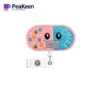 A pink nurse badge reel featuring a cheerful smiley face design, perfect for adding a touch of joy to your uniform.