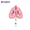 A pink nurse badge holder featuring a heart and lungs design, perfect for healthcare professionals.