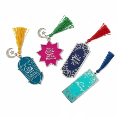 Three colorful Quran bookmarks featuring intricate designs and decorative tassels.