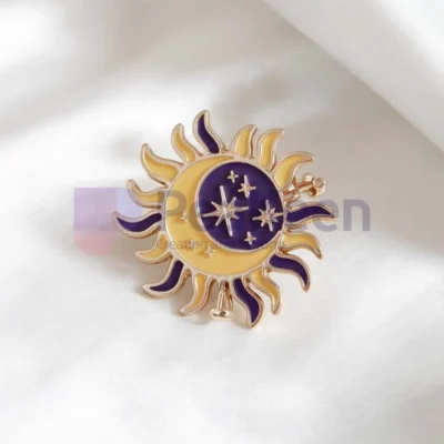 Custom enamel pin featuring a purple sun and moon design on a clean white background.