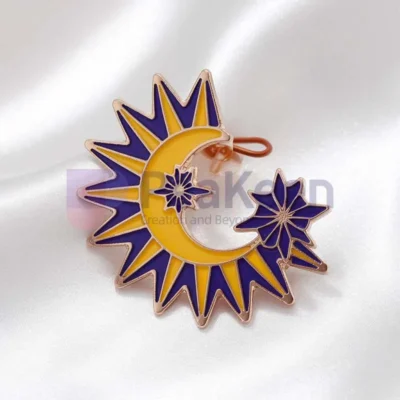 Custom enamel pin featuring a purple and blue star alongside a crescent moon design, perfect for celestial-themed accessories.