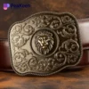A close-up of a lion buckle made from genuine leather, showcasing its intricate engraving on a stylish belt.