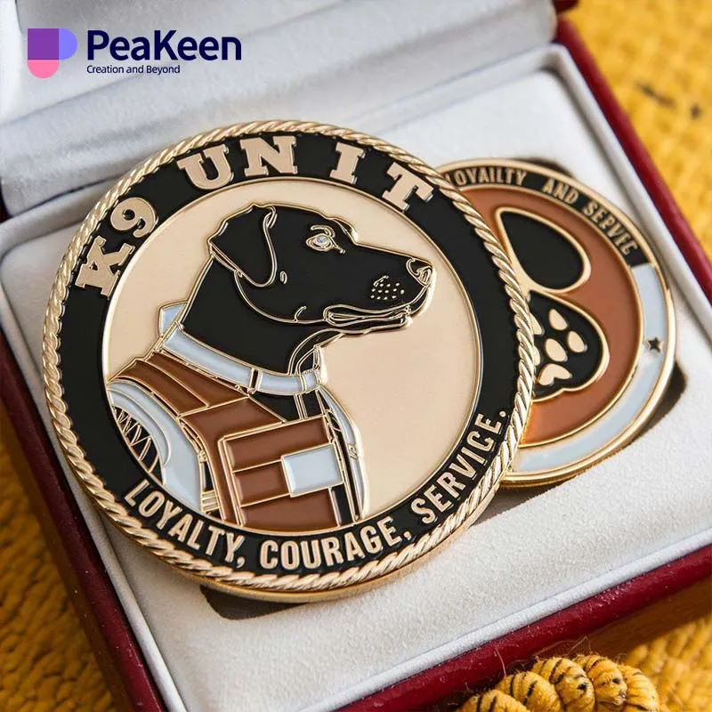 A dog badge and a K9 coin placed together inside a small box, showcasing a unique collectible item.