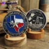 Texas state flag and outline displayed alongside a Texas challenge coin, symbolizing state pride and heritage.