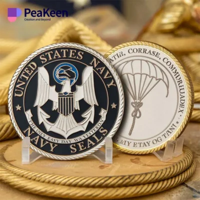 US Navy SEAL challenge coin featuring the emblem and motto, symbolizing honor and commitment to service.