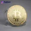 Una moneda de Bitcoin chapada en oro, con su diseño y símbolo distintivos, que representa la criptomoneda física.